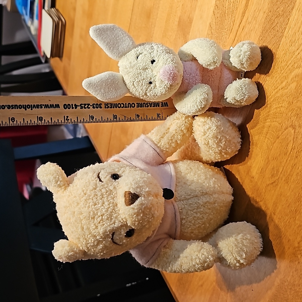 Disney Winnie the Pooh and Piglet plush.
